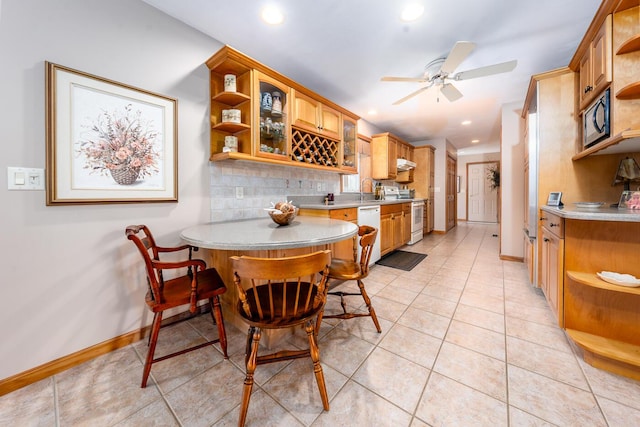 30 Monomessat Way, Chatham, MA 02633 - dining area with baseboards, a ceiling fan, recessed lighting, and light tile patterned floors