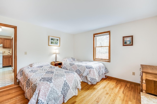 79 Pinewood Cir, Wellfleet, MA 02667 - bedroom with baseboards and light wood-style floors