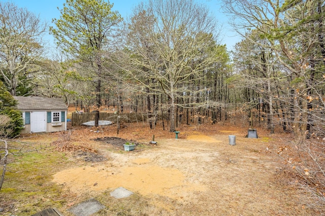 79 Pinewood Cir, Wellfleet, MA 02667 - view of yard with a shed and an outdoor structure