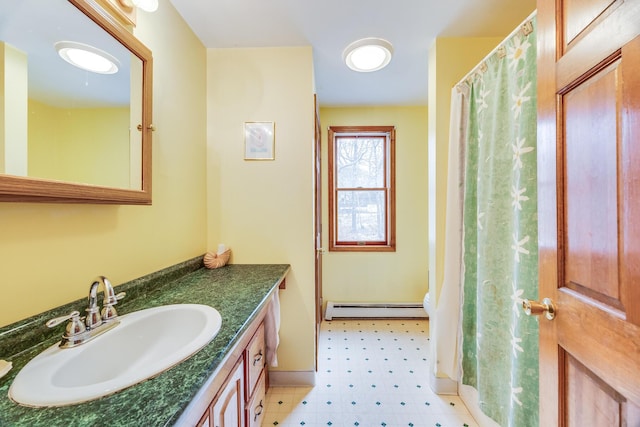 79 Pinewood Cir, Wellfleet, MA 02667 - full bath with vanity, baseboards, tile patterned floors, and baseboard heating
