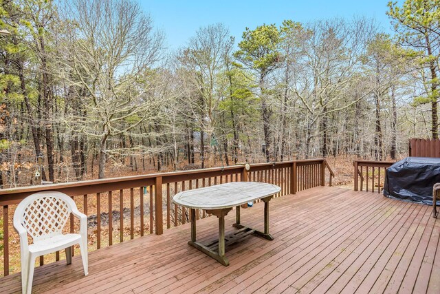 79 Pinewood Cir, Wellfleet, MA 02667 - wooden terrace with grilling area and a forest view