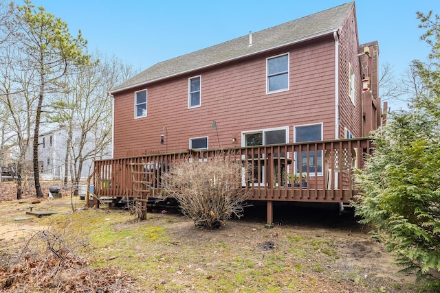 79 Pinewood Cir, Wellfleet, MA 02667 - back of house with a shingled roof and a wooden deck