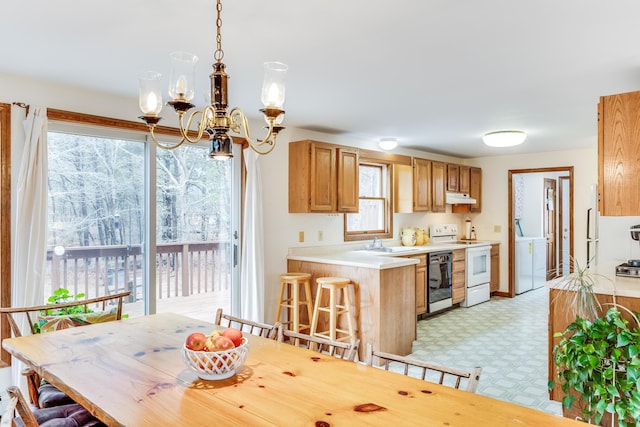 79 Pinewood Cir, Wellfleet, MA 02667 - dining space featuring a chandelier and light floors