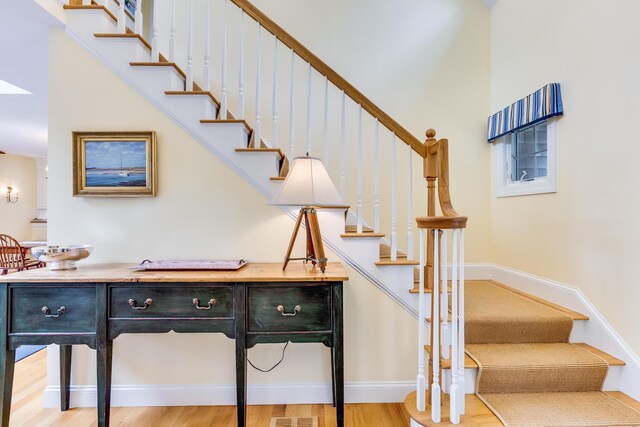 86 Champlain Rd, Chatham, MA 02633 - stairway featuring wood finished floors