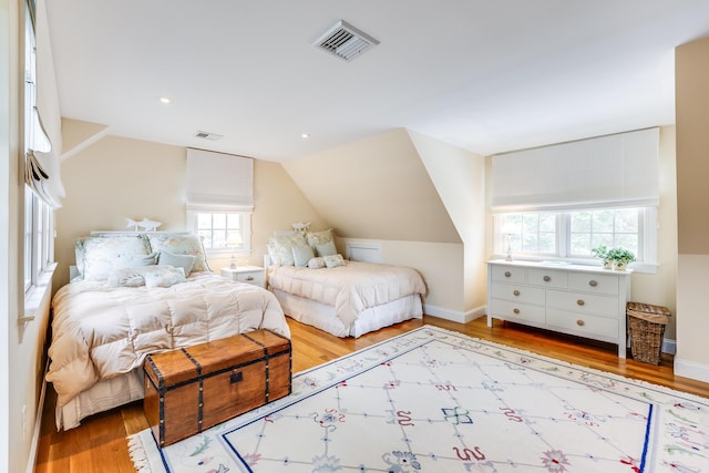 86 Champlain Rd, Chatham, MA 02633 - bedroom featuring vaulted ceiling, wood finished floors, and recessed lighting