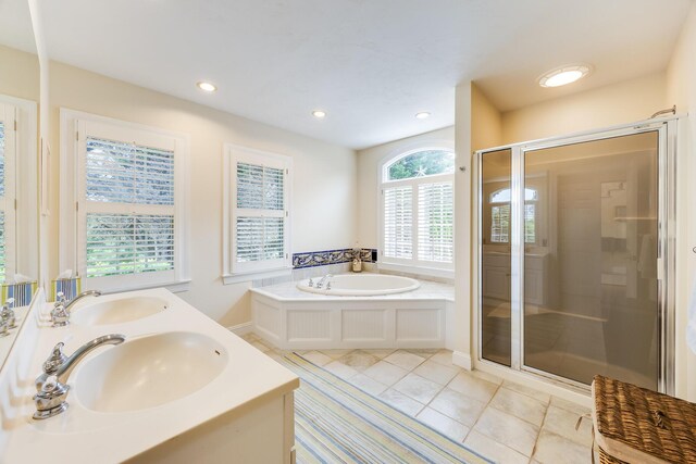 86 Champlain Rd, Chatham, MA 02633 - bathroom with a bath, a shower stall, tile patterned flooring, double vanity, and recessed lighting