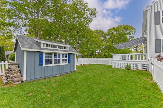 57 Melgo Ln, South Yarmouth, MA 02664 - view of yard featuring an outbuilding and a deck