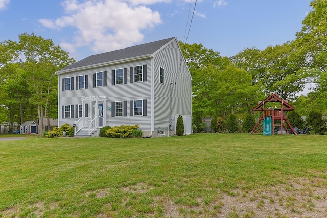 57 Melgo Ln, South Yarmouth, MA 02664 - colonial house featuring a playground and a front yard
