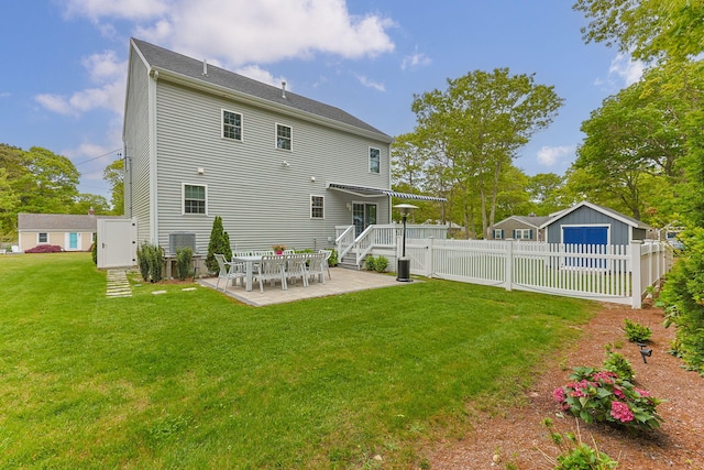 57 Melgo Ln, South Yarmouth, MA 02664 - back of house featuring a patio
