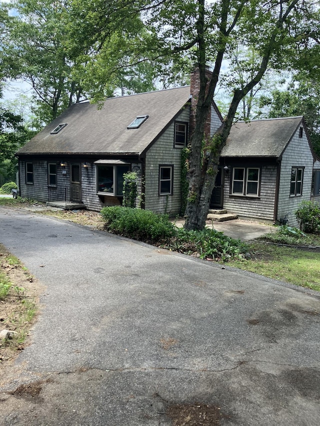 1094 County Rd, Pocasset, MA 02559 - shingle-style home featuring a chimney and a shingled roof