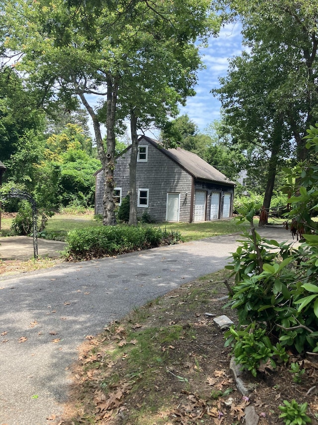 1094 County Rd, Pocasset, MA 02559 - view of home's exterior featuring a detached garage
