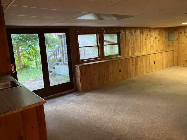 1094 County Rd, Pocasset, MA 02559 - carpeted empty room with wooden walls and a sink