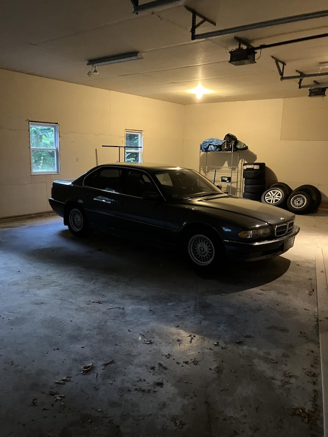 1094 County Rd, Pocasset, MA 02559 - garage with a garage door opener