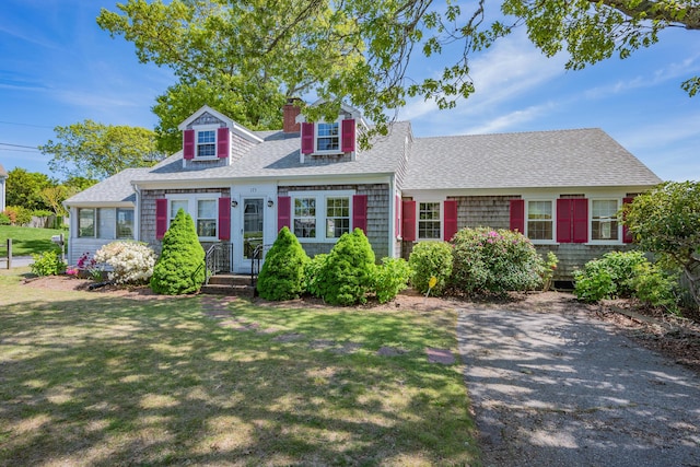 175 Lower County Rd, West Harwich, MA 02671 - cape cod house featuring a front lawn, a shingled roof, and a chimney