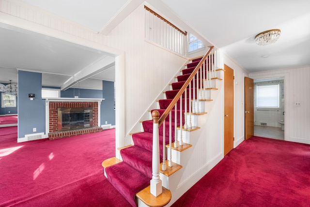 175 Lower County Rd, West Harwich, MA 02671 - staircase with carpet flooring, a fireplace, and baseboards
