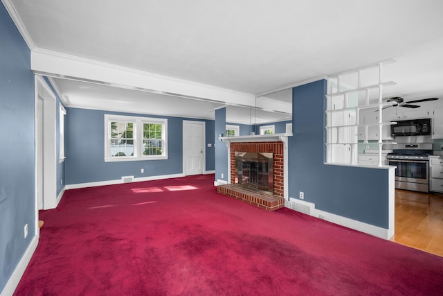 175 Lower County Rd, West Harwich, MA 02671 - unfurnished living room featuring baseboards, a fireplace, crown molding, ceiling fan, and carpet flooring