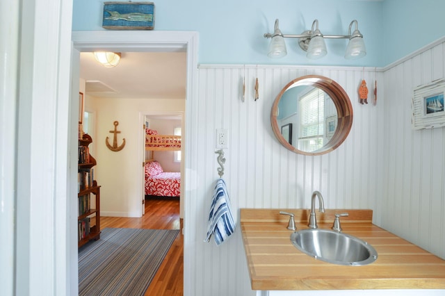 110 Teaticket Path, East Falmouth, MA 02536 - bathroom featuring a sink and wood finished floors