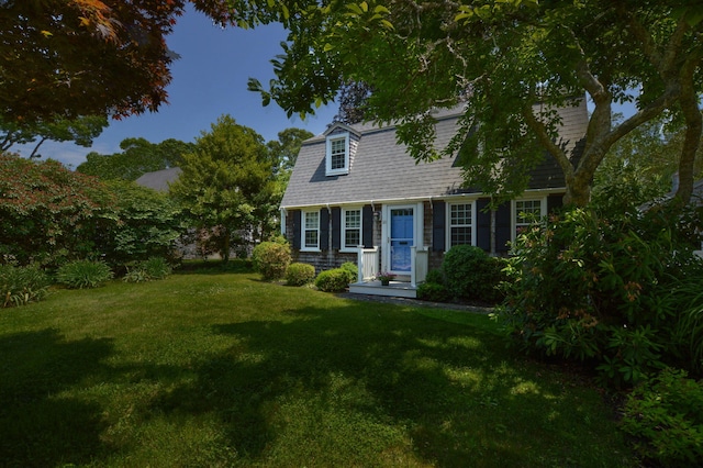 110 Teaticket Path, East Falmouth, MA 02536 - view of front of home with a gambrel roof and a front yard