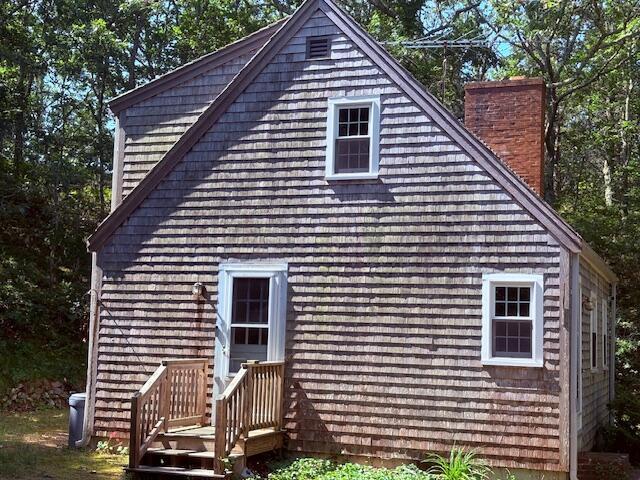 11 Higgins Way, Truro, MA 02666 - view of property exterior featuring a chimney