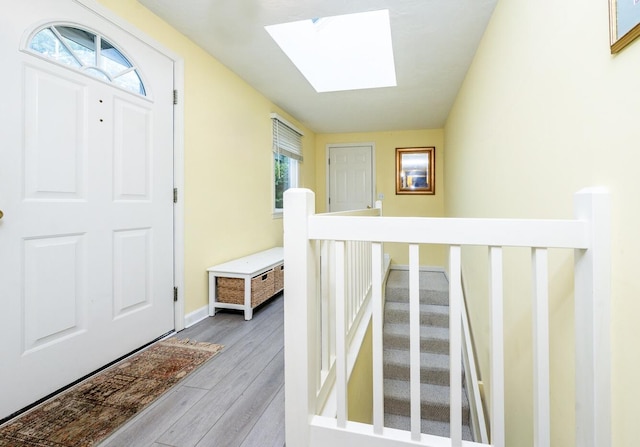 37 Pine Hill Blvd, Mashpee, MA 02649 - foyer entrance featuring a skylight and light wood-style flooring