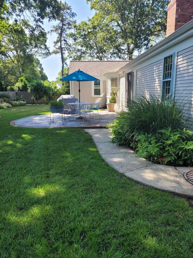 56 Fairwood Rd, South Yarmouth, MA 02664 - view of yard with a wooden deck and fence