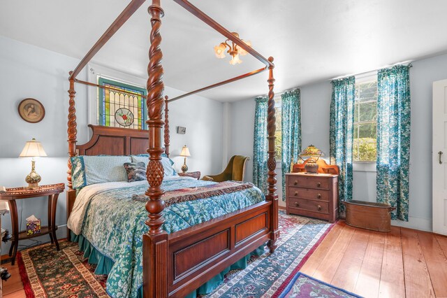 bedroom featuring wood-type flooring