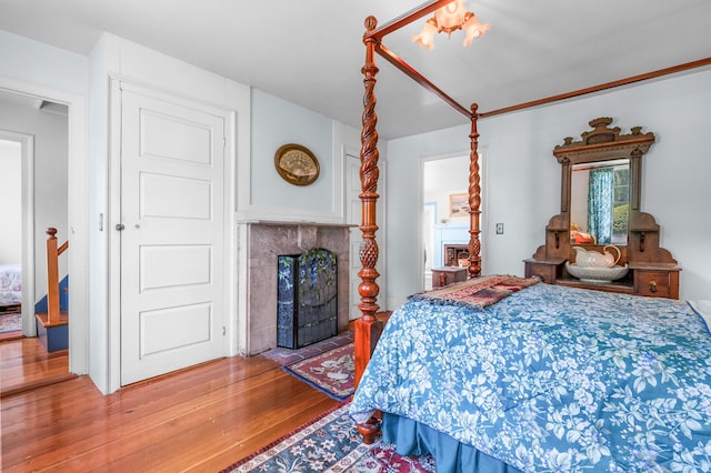 bedroom with hardwood / wood-style floors