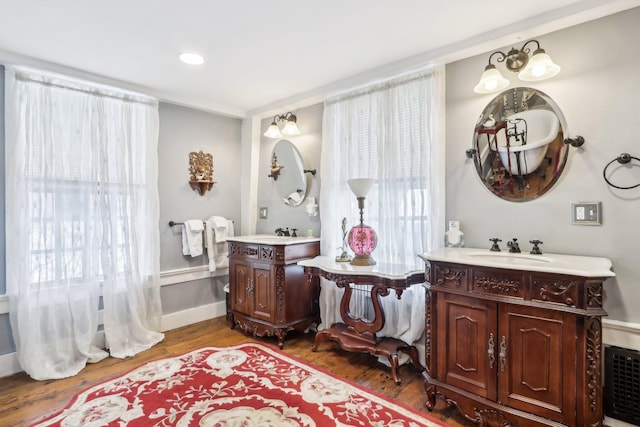 100 Eliot St, Natick, MA 01760 - bathroom with vanity and hardwood / wood-style floors