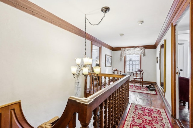 100 Eliot St, Natick, MA 01760 - corridor with a notable chandelier, wood-type flooring, and ornamental molding