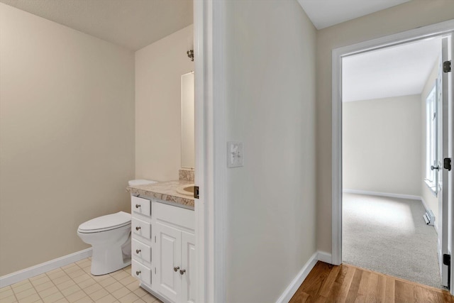 31 John Joseph Rd, Harwich, MA 02645 - half bathroom with vanity and wood finished floors