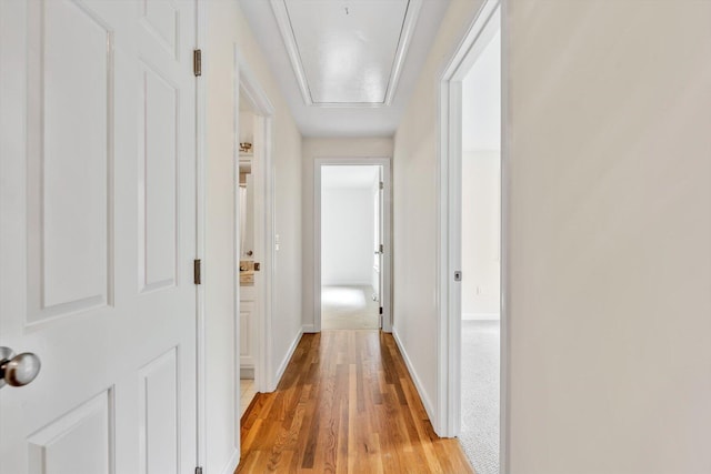 31 John Joseph Rd, Harwich, MA 02645 - hallway featuring light wood-type flooring and attic access