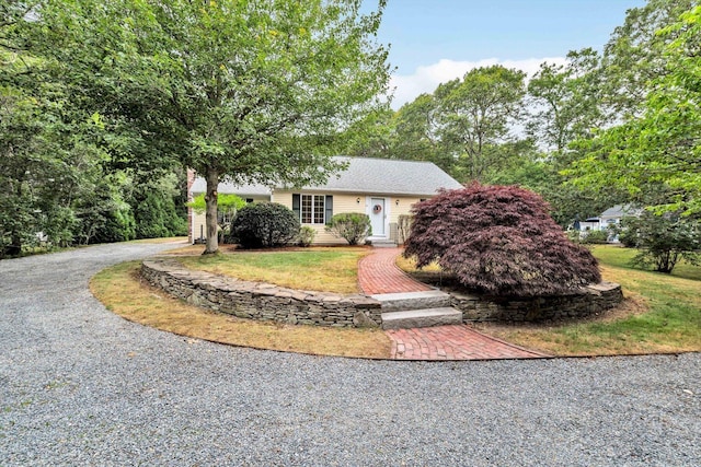 31 John Joseph Rd, Harwich, MA 02645 - view of front of house with a front lawn and curved driveway