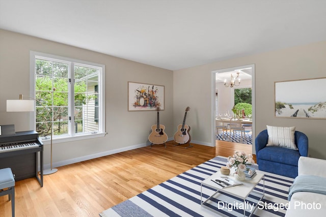 31 John Joseph Rd, Harwich, MA 02645 - living room featuring a chandelier and wood finished floors