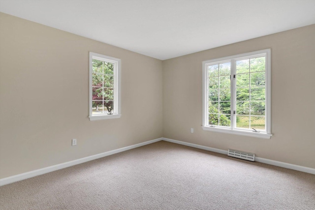 31 John Joseph Rd, Harwich, MA 02645 - spare room featuring healthy amount of natural light and carpet flooring