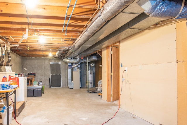 39 Antlers Rd, South Yarmouth, MA 02664 - unfinished basement featuring heating unit and water heater