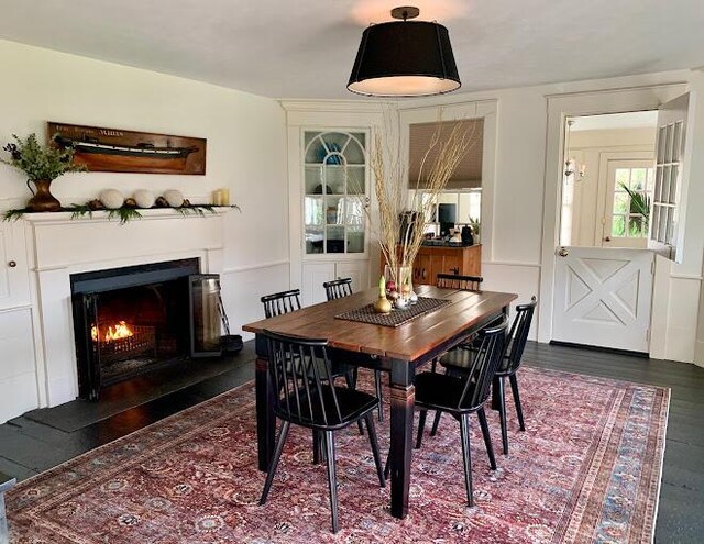 dining room with dark wood-type flooring