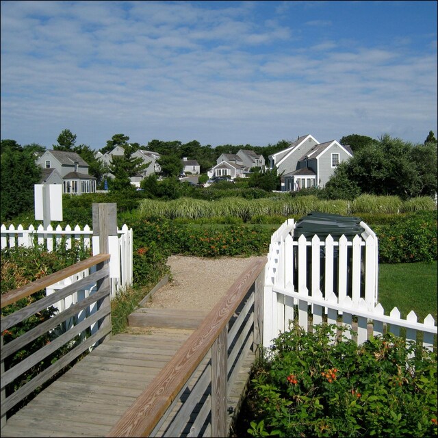 5 Milestone Way, Mashpee, MA 02649 - exterior space featuring fence and a residential view