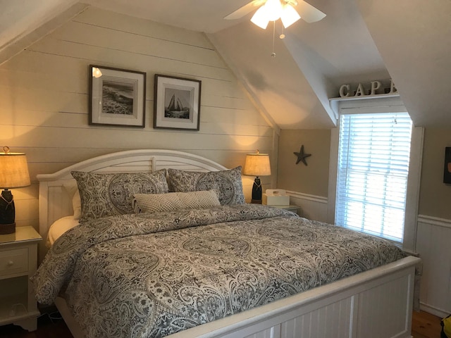 5 Milestone Way, Mashpee, MA 02649 - bedroom with lofted ceiling, a ceiling fan, and wooden walls