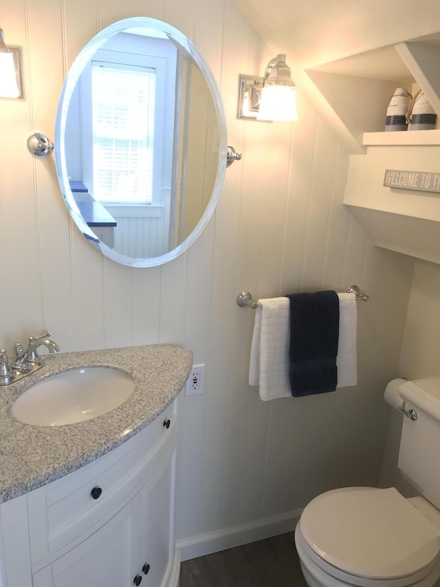 5 Milestone Way, Mashpee, MA 02649 - half bath with baseboards, toilet, vanity, and a decorative wall