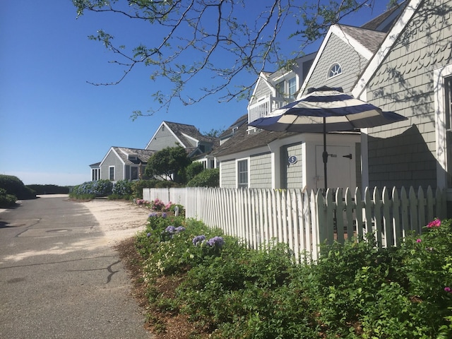 5 Milestone Way, Mashpee, MA 02649 - view of home's exterior featuring fence