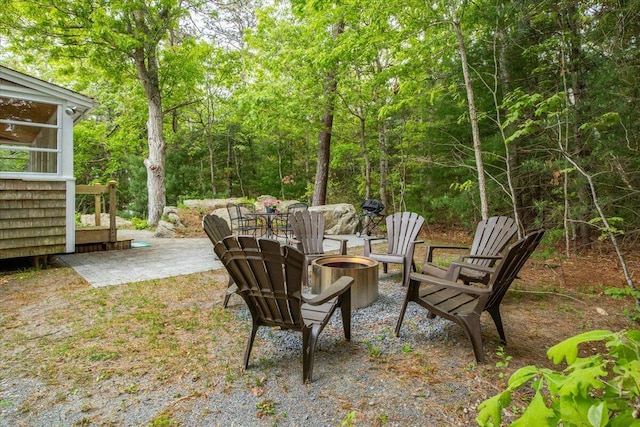 18 Boulder Rd, Brewster, MA 02631 - view of yard featuring a fire pit and a patio area