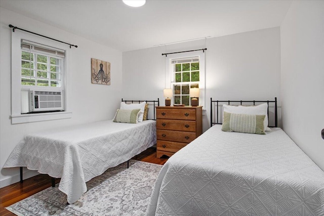 18 Boulder Rd, Brewster, MA 02631 - bedroom with wood finished floors and cooling unit