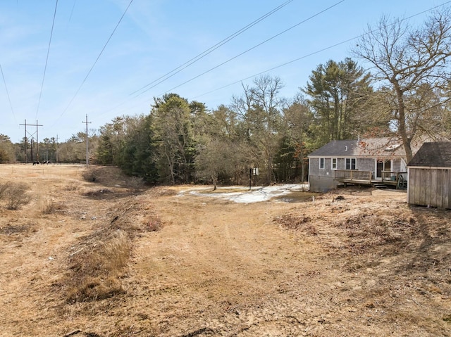 view of yard featuring a deck