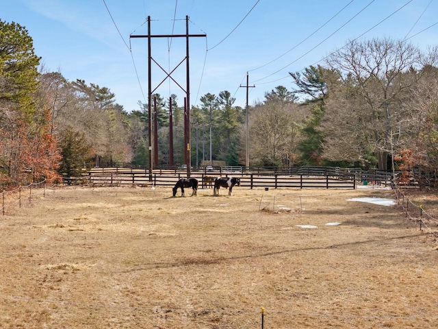 view of home's community with fence and an enclosed area