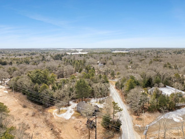 aerial view featuring a view of trees