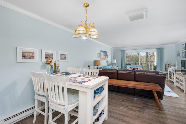 dining room featuring a baseboard radiator, ornamental molding, wood finished floors, and a notable chandelier