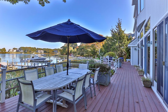 169 Daniels Island Rd, Mashpee, MA 02649 - deck with outdoor dining area and a water view