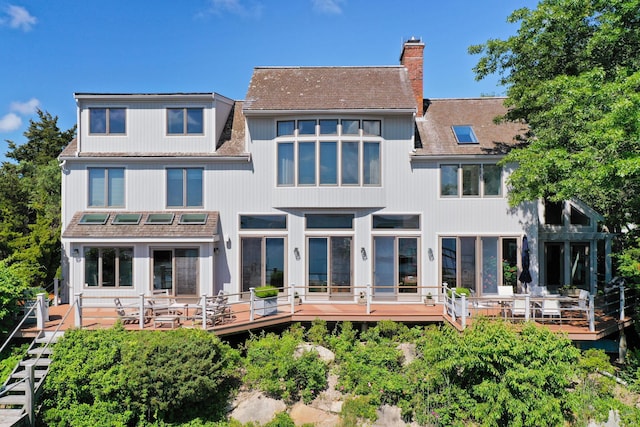 169 Daniels Island Rd, Mashpee, MA 02649 - back of house featuring a chimney and a deck