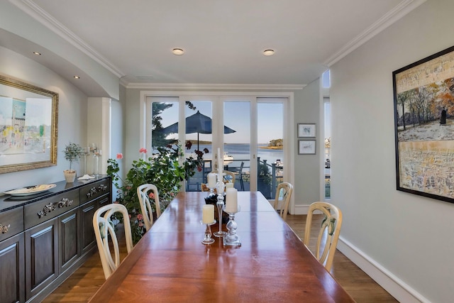 169 Daniels Island Rd, Mashpee, MA 02649 - dining area featuring recessed lighting, wood finished floors, crown molding, and baseboards