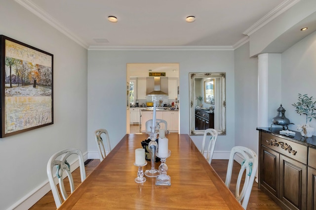 169 Daniels Island Rd, Mashpee, MA 02649 - dining space featuring baseboards, ornamental molding, and wood finished floors
